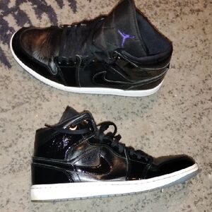 Nike Air Jordan 1 Mid SE "Space Jam" sneaker featuring black patent leather and